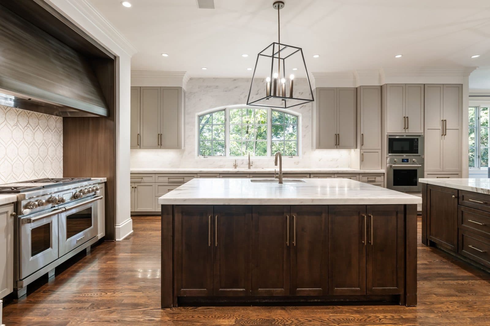 Kitchen with dual islands and a Wolf range at 834 Tyne Valley Ct, Oak Hill Nashville