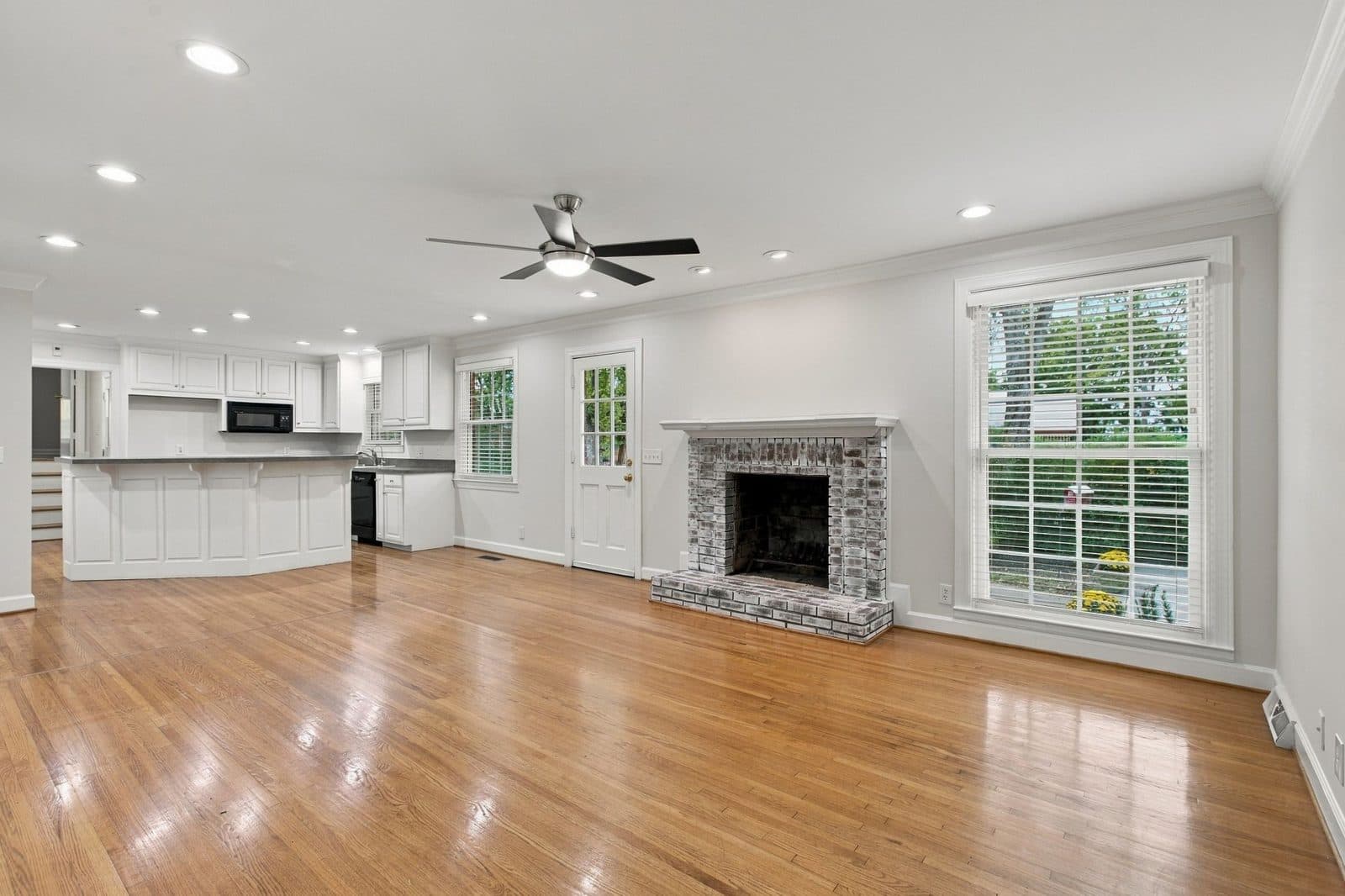 Kitchen with an island and hardwood floors at 721 Lambert Dr, Oak Hill Nashville