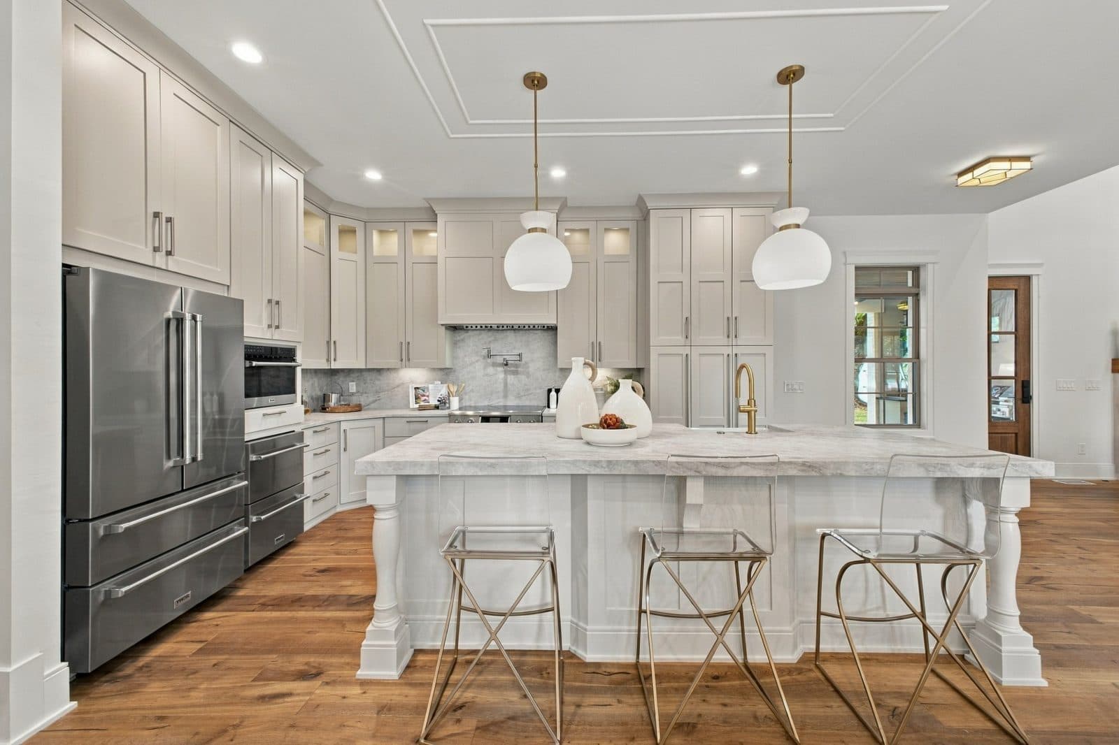 Kitchen with a long island and wood cabinets at 701 Brindley Dr, Oak Hill Nashville