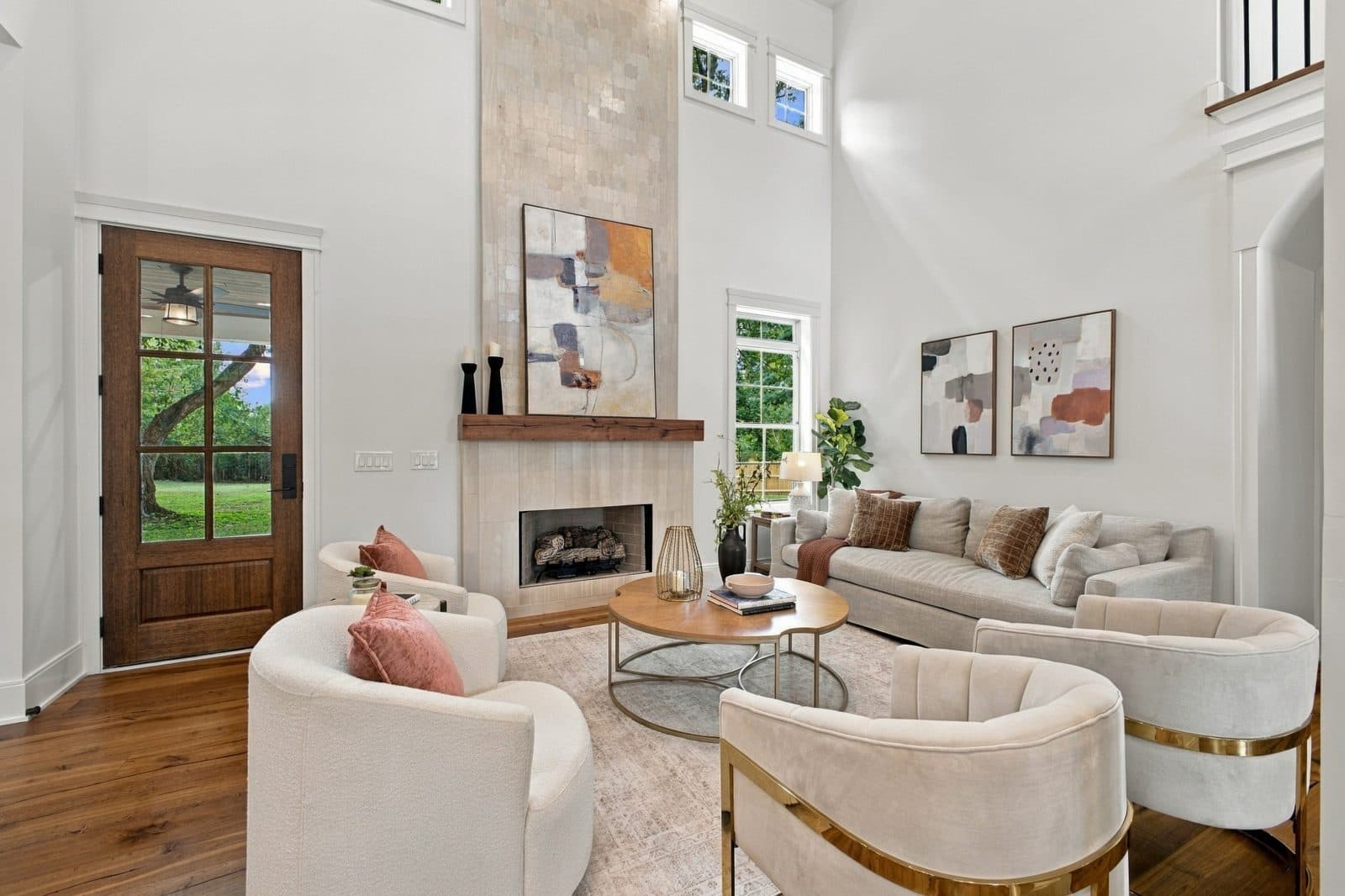 Primary bedroom with light wood floors and glass doors at 701 Brindley Dr, Oak Hill Nashville